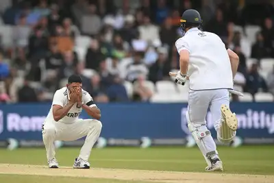 Mohammed Siraj watches England's strong batting performance.