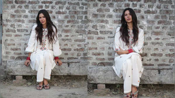 Close-up of Sonam's white floral suit