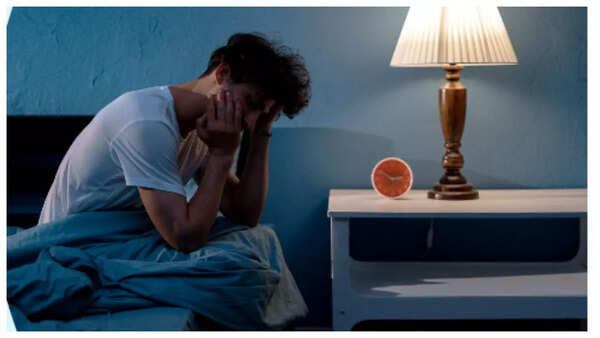 Sleepless person in bed
