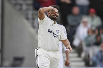 Rishabh Pant celebrates a century during the Test match.