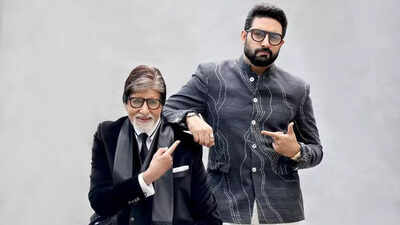 Abhishek Bachchan looking nervous on the set of Sarkar with Amitabh Bachchan