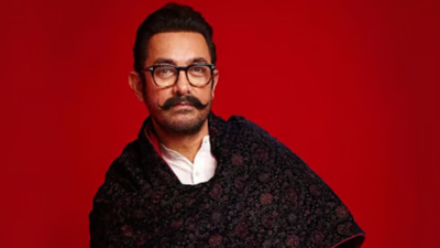 Aamir Khan smiles warmly, excited to attend the Indian Film Festival of Melbourne